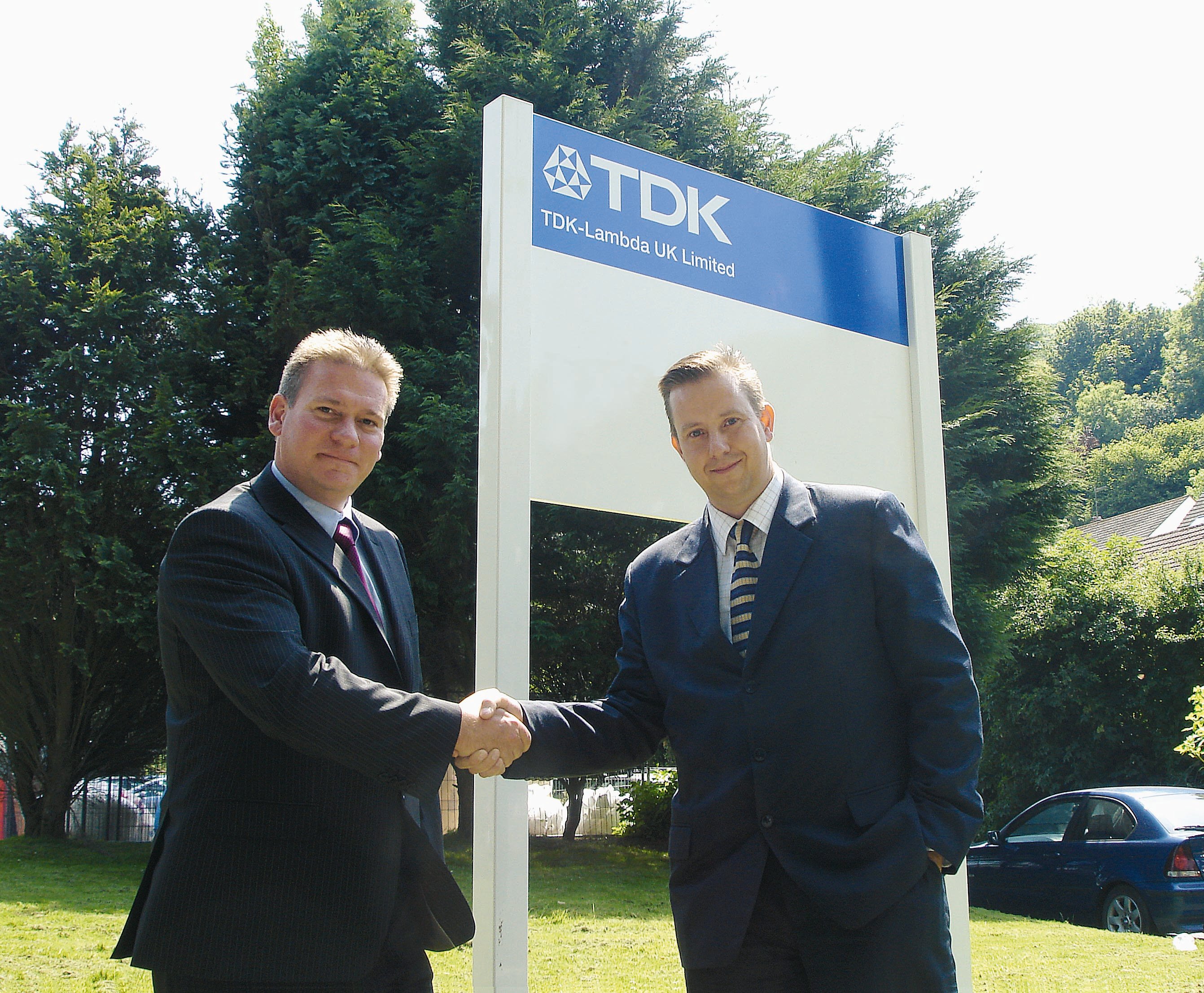 Jonathan Scott, Business Development Manager at TDK-Lambda UK (pictured left), welcomes new signing with Aspen Electronics’ Product Manager, Neil Reynolds